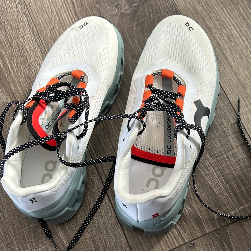 White and Orange Athletic Shoes